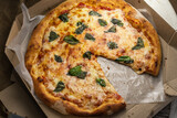 delicious stone pizza with mozzarella tomato and basil