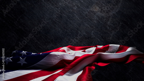 Veterans Day Banner. Authentic Holiday Background featuring United States Flag on Black Rock with Copy-Space. photo