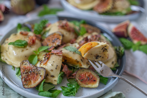 pumpkin tortellini with fresh figs and herbs