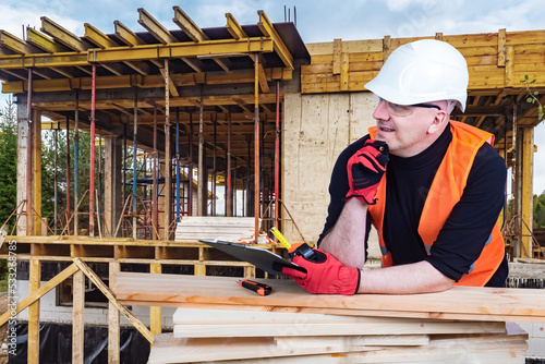 Man builder. Builder in fro...
