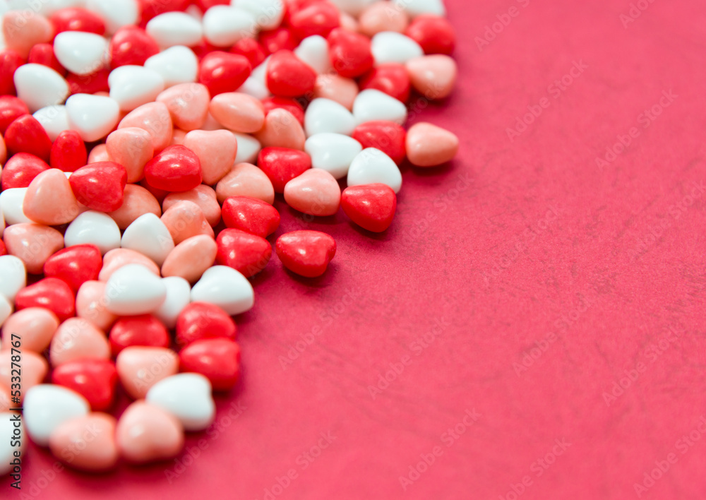 Group of little colorful candy hearts.