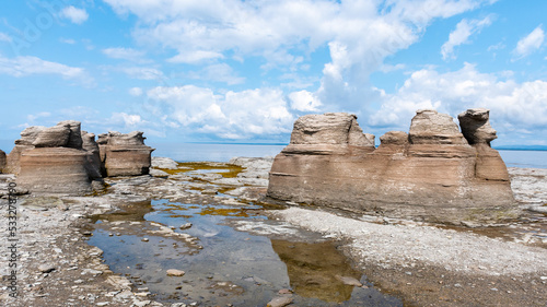 Beautiful view of colossal limestone outcroppings on the "île Nue de Mingan" (Nue island), located in the Mingan archipelago national park reserve, in the north coast region of Quebec, Canada