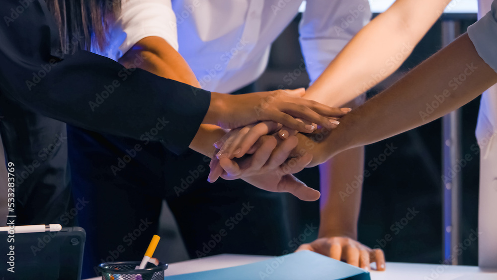 Business Team stack of hands for startup project. Close up of businesspeople putting their hands together.