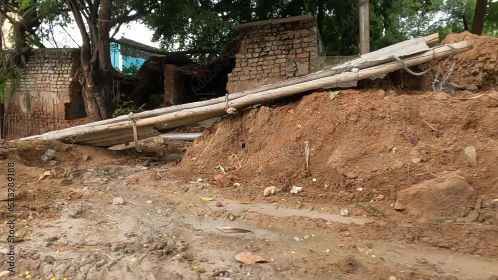 Concrete pillars over the heap of soil Concrete pillars over the heap of soil