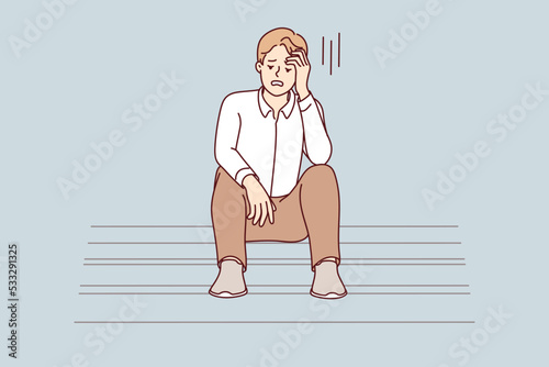 Unhappy young man sit on stairs feel distressed with job loss or failure. Upset male stressed with life or business problems, look for solution. Vector illustration. 
