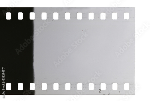 Strip of old celluloid film with dust and scratches