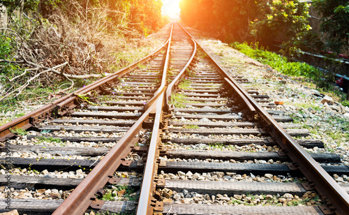 Two railway tracks merge together