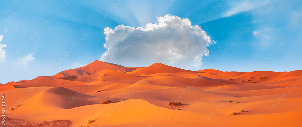 Beautiful sand dunes in the Sahara desert with amazing cloudy sky ...
