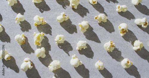 Image of close up of popcorn on gray background