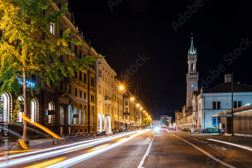 Germany, Baden-Wurttemberg, Konstanz, Vehicle light trails stretching along city street at night