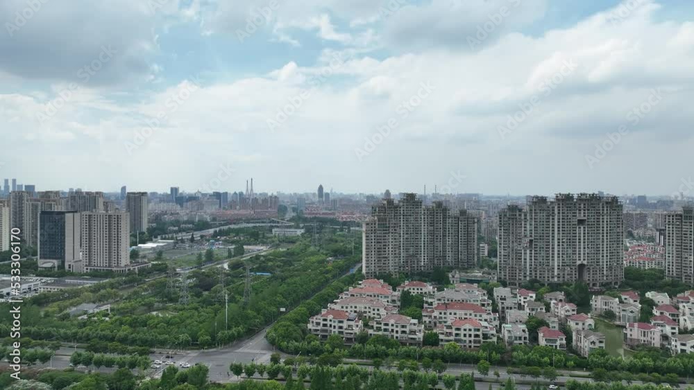 City landscape and apartment buildings. Drone aerial view. Drone flying over city in cloudy day. Cityscape and and the buildings in the city. Real estate, economy, business concept b-roll footage. City landscape and apartment buildings. Drone aerial view. Drone flying over city in cloudy day. Cityscape and and the buildings in the city. Real estate, economy, business concept b-roll footage.