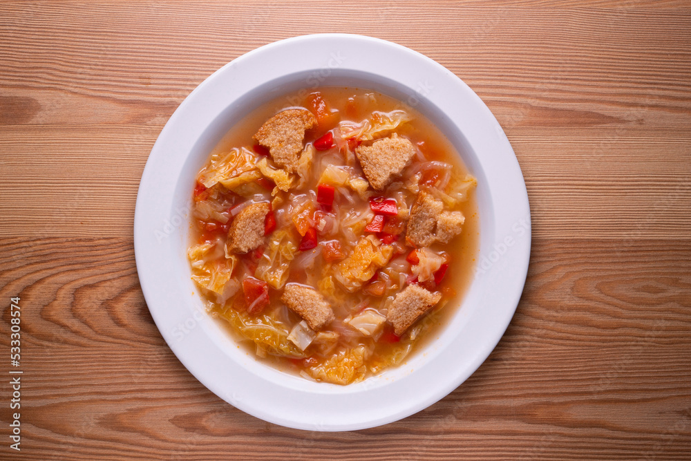 Menorcan soup. Traditional recipe from the island of Menorca in the Balearic Islands. Traditional tapas from the islands with bread, peppers and white cabbage. Menorcan soup. Traditional recipe from the island of Menorca in the Balearic Islands. Traditional tapas from the islands with bread, peppers and white cabbage.