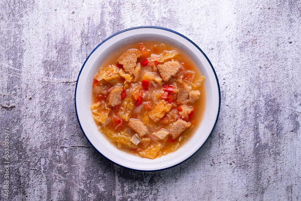 Menorcan soup. Traditional recipe from the island of Menorca in the Balearic Islands. Traditional tapas from the islands with bread, peppers and white cabbage. Menorcan soup. Traditional recipe from the island of Menorca in the Balearic Islands. Traditional tapas from the islands with bread, peppers and white cabbage.