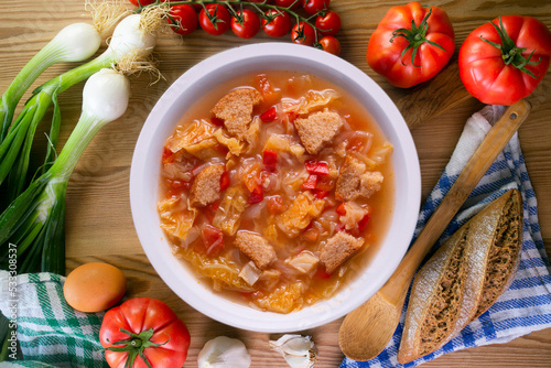 Menorcan soup. Traditional recipe from the island of Menorca in the Balearic Islands. Traditional tapas from the islands with bread, peppers and white cabbage. photo
