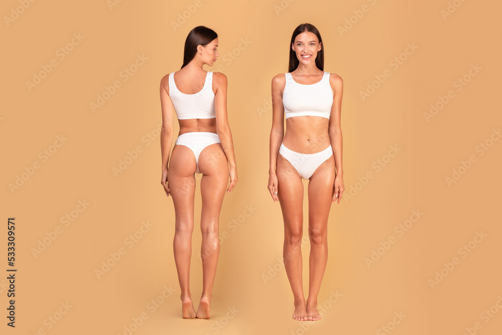 Full length shot of front and back view of slim lady posing on beige  background, demonstrating perfect body shape Stock Photo