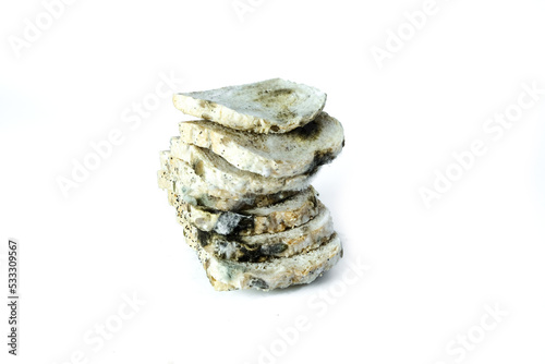Fungus on bread slides vertically on the floor, white liang health concept. photo