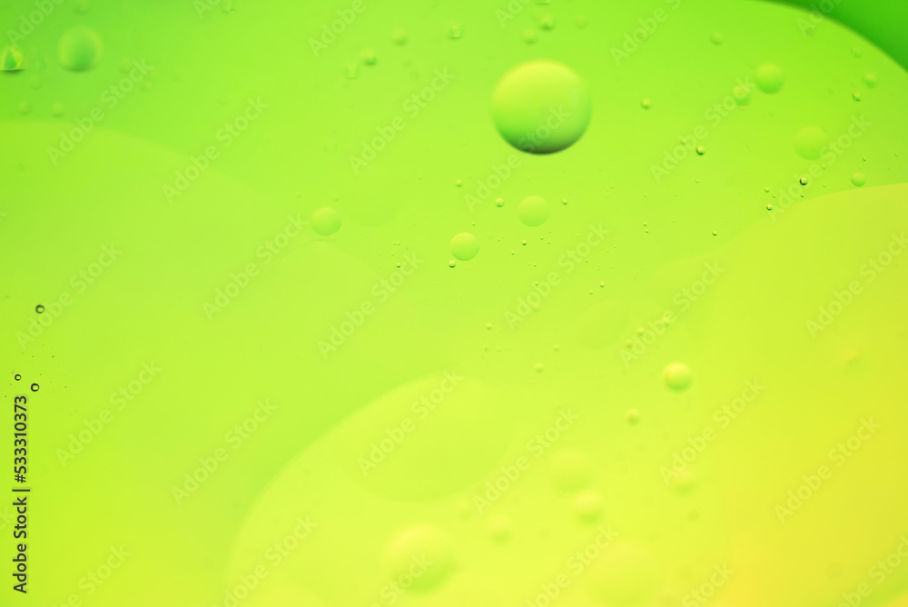 Green and yellow abstract background picture made with oil, water and soap