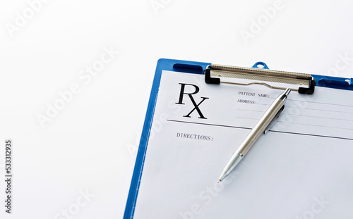 Closeup of clipboard, pen and medical stethoscope