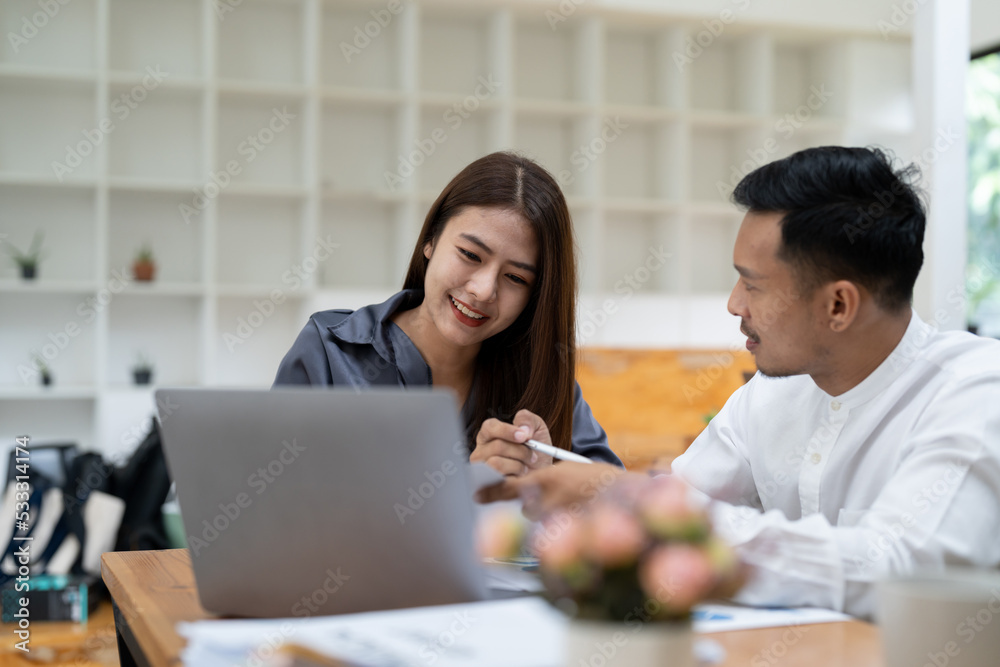 Asian business adviser meeting to analyze and discuss the situation on the financial report in the meeting room.Investment Consultant, Financial advisor and accounting concept Asian business adviser meeting to analyze and discuss the situation on the financial report in the meeting room.Investment Consultant, Financial advisor and accounting concept