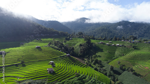 Aerial views beautiful of Small house and rice terraces field at pabongpaing village rice terraces Mae-Jam Chiang mai, Thailand. local organic natural travel.