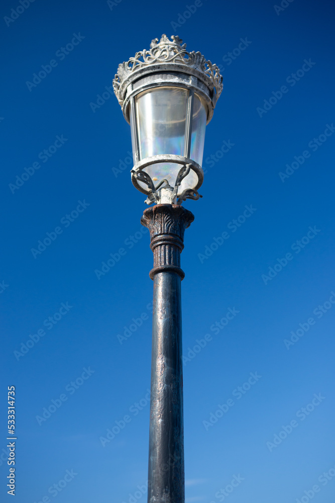 Victorian streetlight against sky