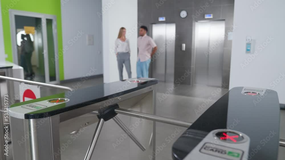 Pass system at the entrance to the office building, african manager exit through the turnstile, international office. Pass system at the entrance to the office building, african manager exit through the turnstile, international office.
