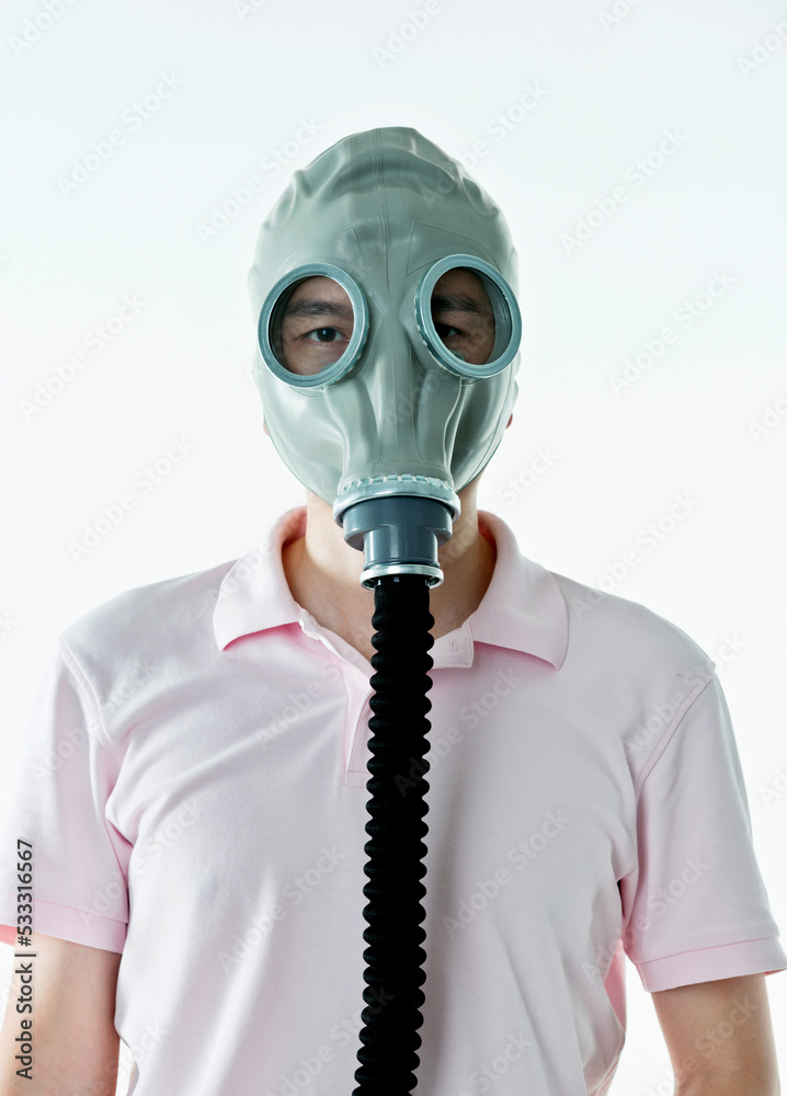Man in gas mask isolated on white background Man in gas mask isolated on white background