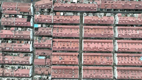 The traditional buildings waiting for demolition. Drone aerial view. The traditional Shikumen buildings waiting for tearing down.  Real estate, economy, business concept b-roll footage. photo