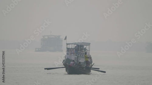 Boats Cruising Through A River In The Sundarban National Park, India