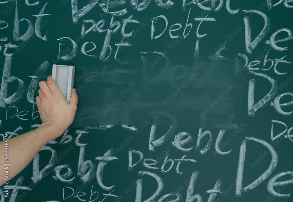 Wiping debt on a chalkboard