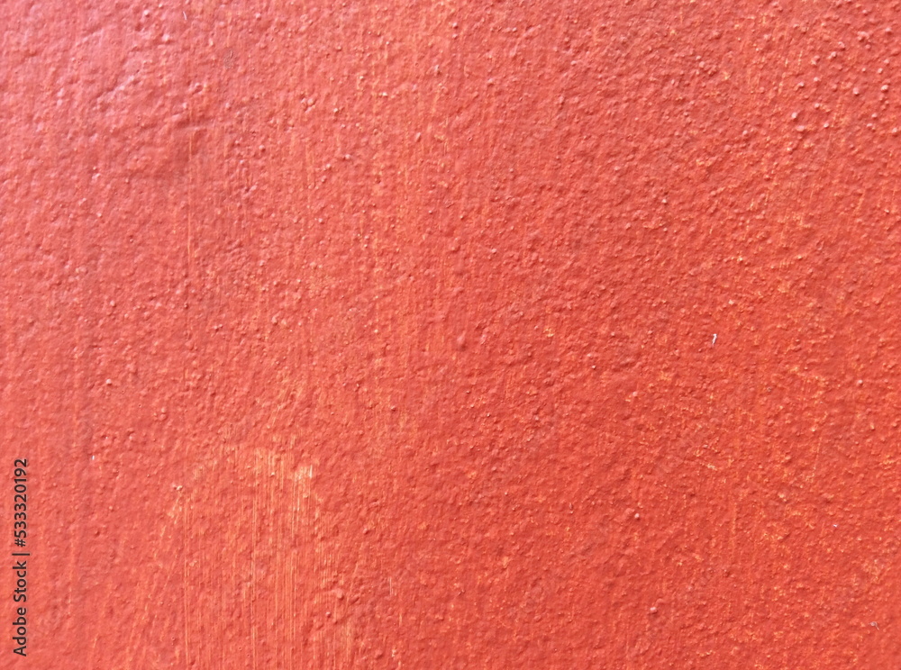 Texture concrete painted with red paint