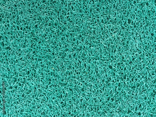 Green doormat texture background