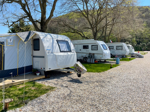 Caravan campsite with travel trailers in a row. Riva, Istanbul, Turkey - April 04, 2022