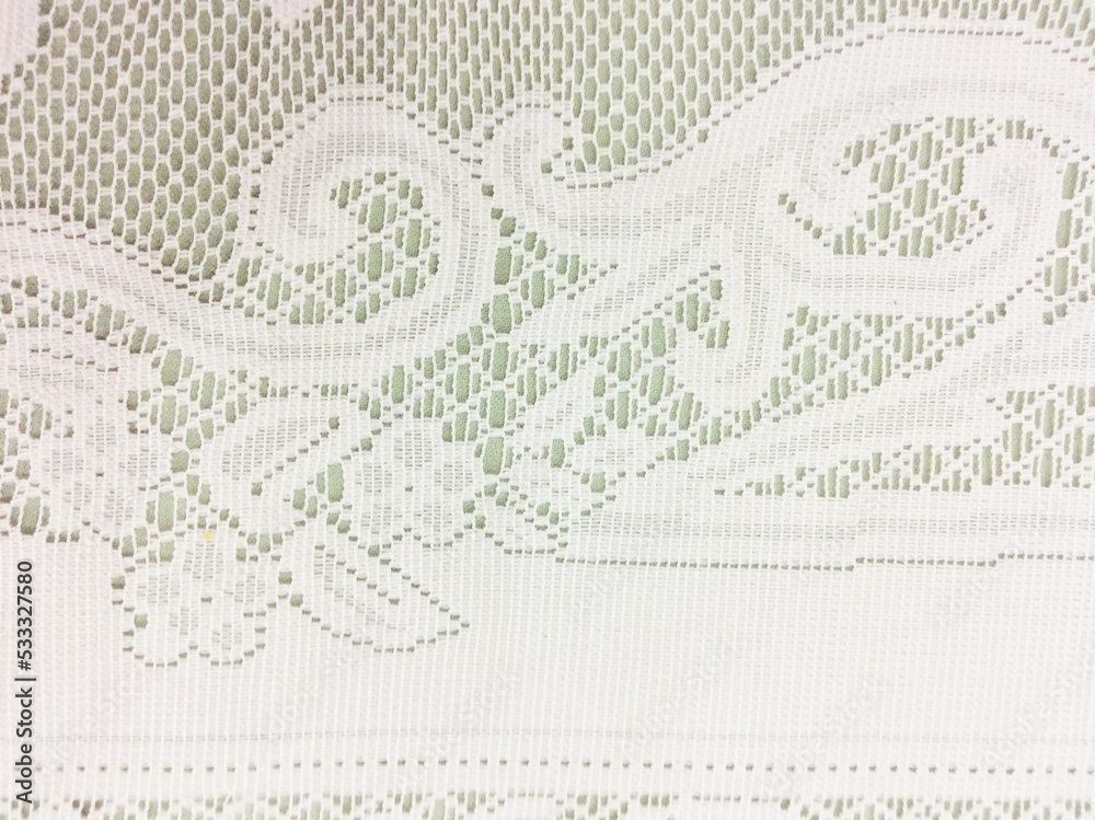 Obraz premium White lace isolated on brown background