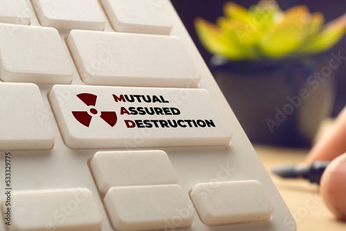 Mutual assured destruction concept: computer keyboard with nuclear symbol
