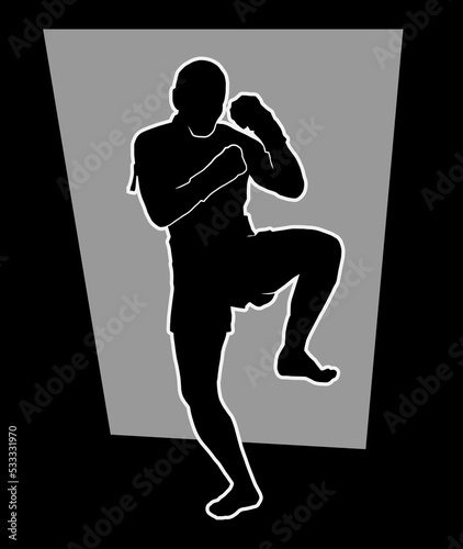 Kickboxing or muaythai fighter prepares to deliver a high kick