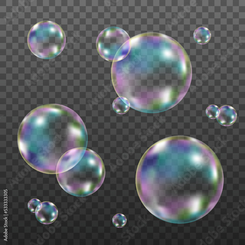 Set of realistic transparent colorful soap bubbles.