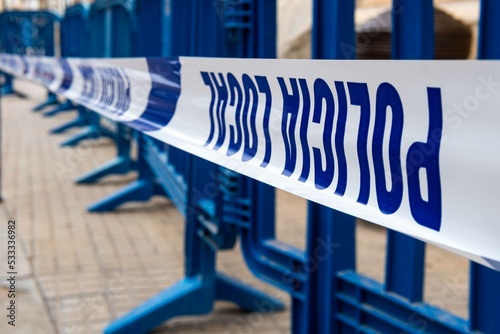 Close-up of a police cordon of local Spain police