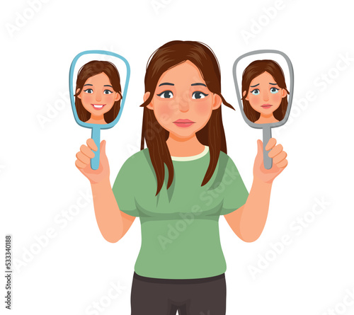 Young woman suffer from bipolar disorder manic depression with two faced expressions of happy and sad face showing in the mirror