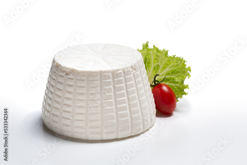 ricotta with salad leaf and cherry tomato on a white background