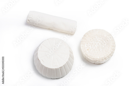 fresh white cheeses on a white background