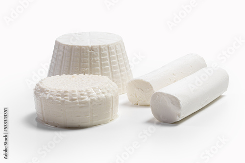 fresh white cheeses on a white background