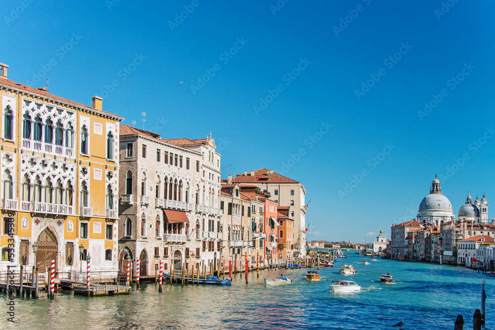 Fototapeta premium Facades of centennial buildings on the banks of the Grand Canal in Venice. Italy, 2019