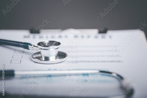 medical report  stethoscope  on desk  health check and analysis concept  medical report  health care  patient diagnosis or hospital report  patient history document.