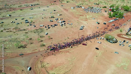 Aerial view of the crowds at the start of the Freedom Day Festival march in the remote community of Kalkaringi, Northern Territory, Australia. 26 August 2022 photo