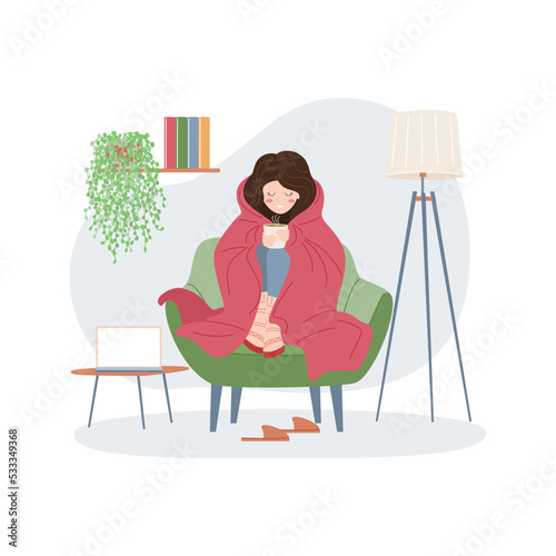 Girl in warm clothes drinks a hot drink and warms herself under a blanket. Cold temperature in the apartment. Saving energy resources. Crisis and economy concept. Vector illustration.
