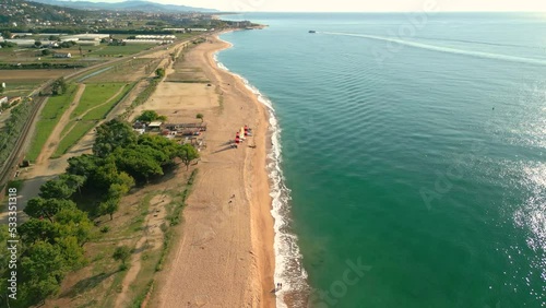 Pineda de Mar beach without people Santa Susanna Costa del Maresme province of Barcelona in Spain aerial views with drone photo