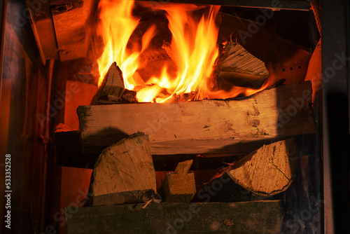 fire burns in the fireplace © Smole