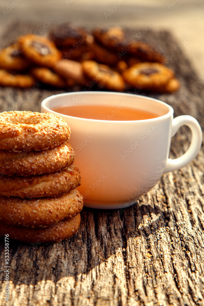 Homemade sweet cookies with tea. Delicious sweet cookies with tea on the table. Dessert cookies with tea in a cafe. The concept of desserts, sweets, coffee shop. Homemade sweet cookies with tea. Delicious sweet cookies with tea on the table. Dessert cookies with tea in a cafe. The concept of desserts, sweets, coffee shop.