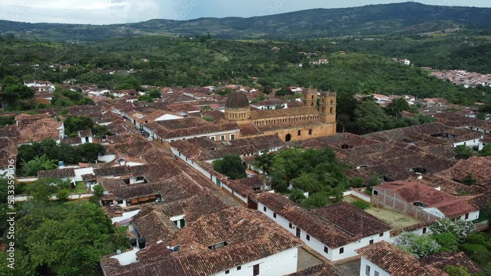 Barichara is a town in northern Colombia South America known for its cobbled streets and colonial architecture - drone aerial view of the touristic attraction village with tiled house roofs Barichara is a town in northern Colombia South America known for its cobbled streets and colonial architecture - drone aerial view of the touristic attraction village with tiled house roofs